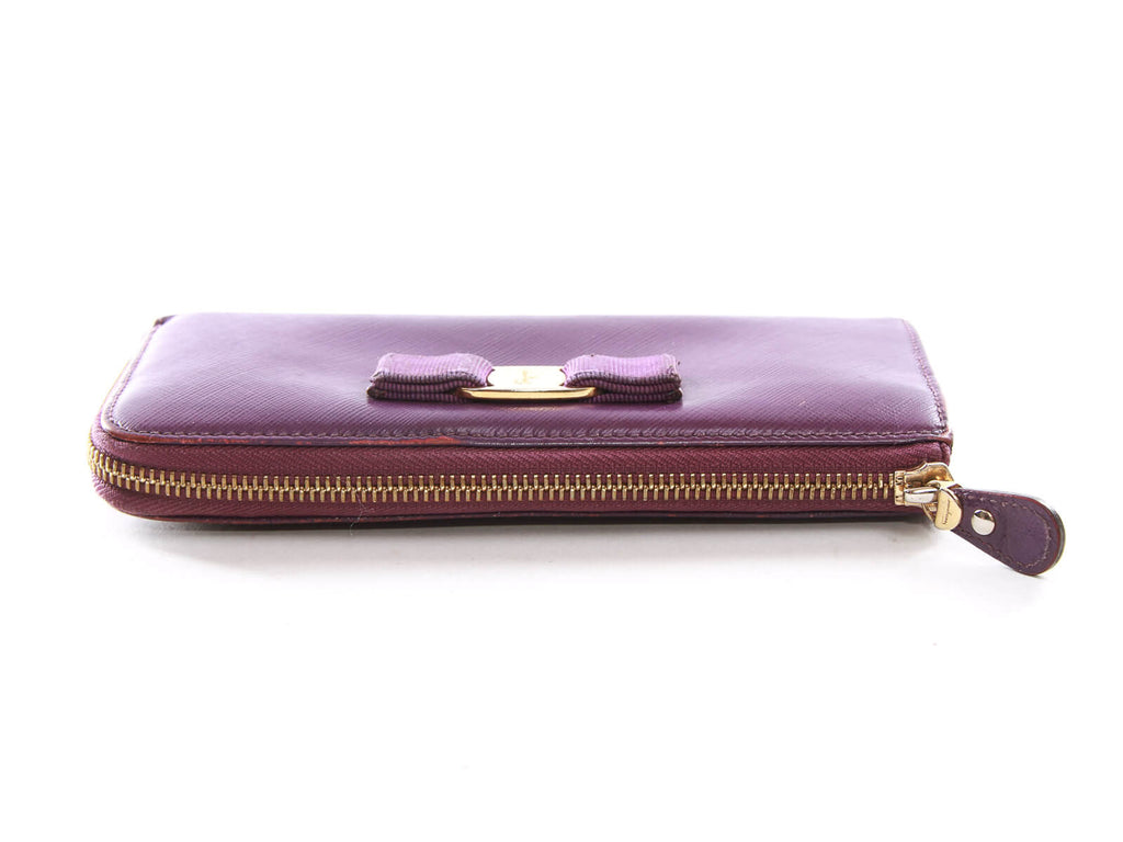 Authentic Salvatore Ferragamo purple Zip-around long wallet