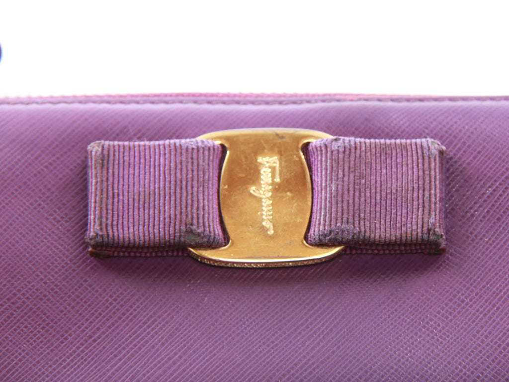 Authentic Salvatore Ferragamo purple Zip-around long wallet