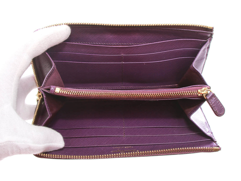 Authentic Salvatore Ferragamo purple Zip-around long wallet