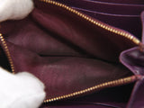 Authentic Salvatore Ferragamo purple Zip-around long wallet