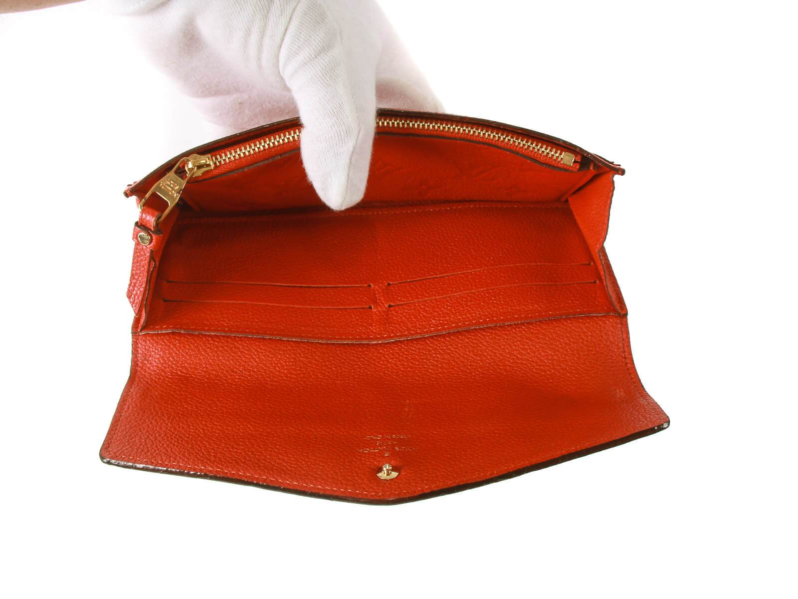 Louis Vuitton Orange Monogram Empreinte Curieuse Long Wallet Leather  ref.224637 - Joli Closet