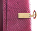 Authentic Salvatore Ferragamo dark pink python and calf leather wallet